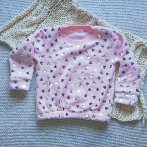 Buzo beba piel corazones rosa